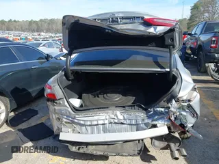 2019 Toyota Camry LE z VIN 4T1B11HK8KU681713, wystawiony jako IAAI lot #41823019 z przebiegiem 99 000 mil mil oraz . Historia ofert i sprzedaży dostępna na DreamBid. Obrazek 16.