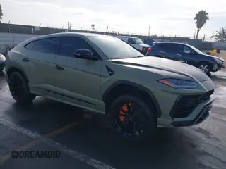 2020 Lamborghini Urus z VIN ZPBUA1ZL5LLA08057, wystawiony jako IAAI lot #40948767 z przebiegiem 77 064 mil mil oraz . Historia ofert i sprzedaży dostępna na DreamBid. Obrazek 1.