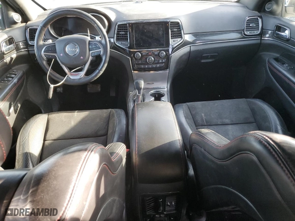2019 Jeep Grand Cherokee Trailhawk with VIN 1C4RJFLG2KC692683, listed as a Copart auction lot 85011344 with 103,769 mi miles and Salvage Title. Bid and sale history available at carsss.com. Image 8.