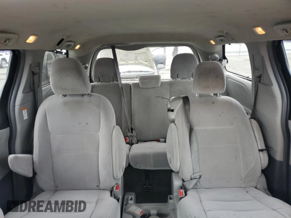 2015 Toyota Sienna LE AAS with VIN 5TDKK3DC1FS577795, listed as a Copart auction lot 66215355 with 197,902 mi miles and Salvage title. Bid and sale history available at DreamBid. Image 10.