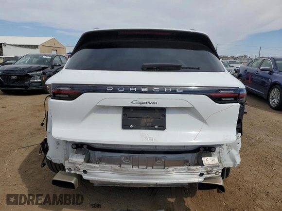 2022 Porsche Cayenne z VIN WP1AA2AY2NDA04695, wystawiony jako Copart lot #52499635 z przebiegiem 25 087 mil mil oraz Szkoda całkowita • Salvage title. Historia ofert i sprzedaży dostępna na DreamBid. Obrazek 6.