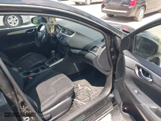 2016 Nissan Sentra S with VIN 3N1AB7AP4GY210655, listed as a IAAI auction lot 41946054 with 165,068 mi miles. Bid and sale history available at carsss.com. Image 5.