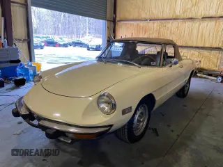 1973 Alfa Romeo Spider z VIN AR3041681, wystawiony jako Copart lot #53616295 z przebiegiem 20 513 mil mil oraz Czysty tytuł • Clean title. Historia ofert i sprzedaży dostępna na DreamBid. Obrazek 2.
