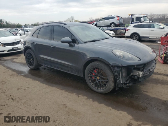 2017 Porsche Macan GTS with VIN WP1AG2A55HLB50104, listed as a Copart auction lot 52354985 with 111,447 mi miles and Salvage title. Bid and sale history available at DreamBid. Image 4.