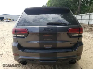 2015 Jeep Grand Cherokee SRT with VIN 1C4RJFDJ9FC842448, listed as a Copart auction lot 56956284 with 178,141 mi miles and Salvage Title. Bid and sale history available at carsss.com. Image 6.