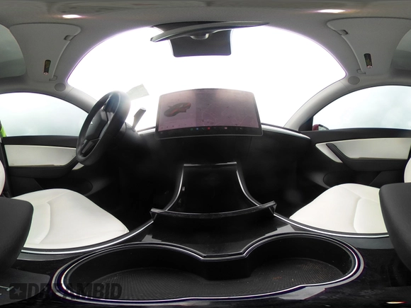 2021 Tesla Model Y Long Range with VIN 5YJYGDEE5MF085032, listed as a IAAI auction lot 41982925 with 64,541 mi miles and . Bid and sale history available at DreamBid. Image 20.