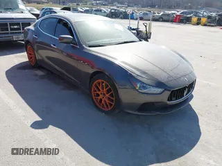 2015 Maserati Ghibli S Q4 z VIN ZAM57RTAXF1135236, wystawiony jako IAAI lot #41757655 z przebiegiem 100 677 mil mil oraz . Historia ofert i sprzedaży dostępna na DreamBid. Obrazek 1.