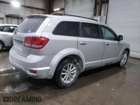 2013 Dodge Journey SXT with VIN 3C4PDCBB1DT558323, listed as a Copart auction lot 45953885 with 165,781 mi miles and Salvage Title. Bid and sale history available at DreamBid. Image 3.
