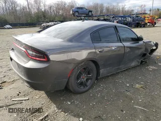 2021 Dodge Charger SXT with VIN 2C3CDXBG9MH541736, listed as a Copart auction lot 48955525 with 100,997 mi miles and Salvage Title. Bid and sale history available at carsss.com. Image 3.
