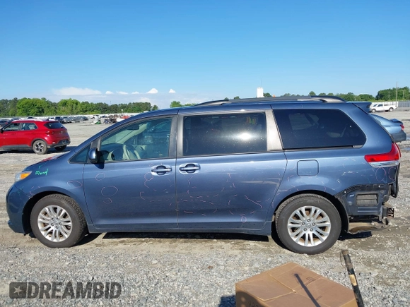 2014 Toyota Sienna XLE with VIN 5TDYK3DC9ES526117, listed as a IAAI auction lot 42247546 with 119,096 mi miles and . Bid and sale history available at DreamBid. Image 14.
