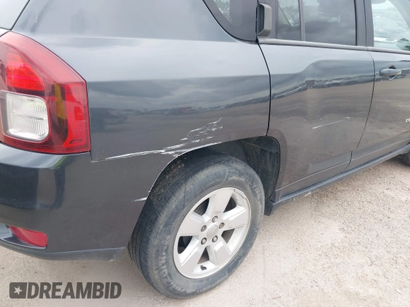 2014 Jeep Compass Sport with VIN 1C4NJCBA7ED882522, listed as a IAAI auction lot 42122474 with 187,157 mi miles and . Bid and sale history available at DreamBid. Image 12.