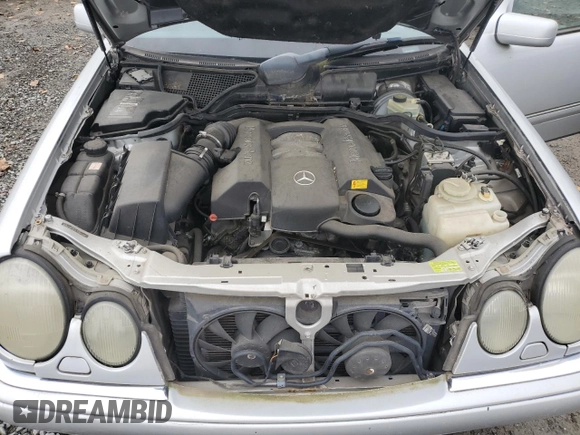 1999 Mercedes-Benz E-Class with VIN WDBJF65H5XA906877, listed as a Copart auction lot 76156014 with 141,956 mi miles and Clean Title. Bid and sale history available at carsss.com. Image 11.