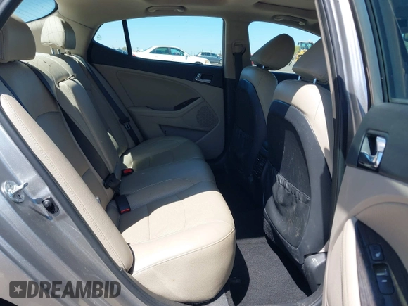 2014 Kia Optima EX with VIN 5XXGN4A75EG317958, listed as a IAAI auction lot 42075557 with 138,903 mi miles and . Bid and sale history available at carsss.com. Image 8.