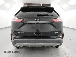 2020 Ford Edge SEL с VIN 2FMPK3J90LBA73990, выставлен на аукционе Copart как лот 61035945 с пробегом 113 511 миль миль и Чистый • Clean title. История ставок и продаж доступна на DreamBid. Изображение 6.