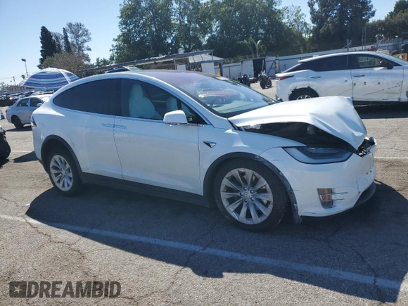 2020 Tesla Model X Long Range with VIN 5YJXCAE26LF270135, listed as a Copart auction lot 49711735 with Not Provided miles and Salvage Title. Bid and sale history available at carsss.com. Image 4.