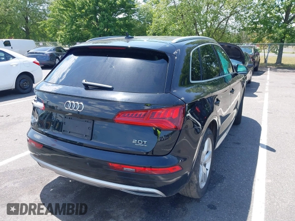 2018 Audi Q5 Premium Plus z VIN WA1BNAFY5J2237208, wystawiony jako IAAI lot #39738297 z przebiegiem 93 523 mil mil oraz . Historia ofert i sprzedaży dostępna na DreamBid. Obrazek 4.