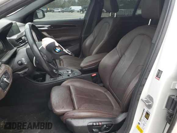 2019 BMW X2 sDrive28i with VIN WBXYJ3C58K5N39693, listed as a Copart auction lot 86760414 with 77,668 mi miles and Salvage Title. Bid and sale history available at carsss.com. Image 7.