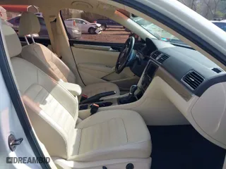 2016 Volkswagen Passat 1.8T SEL with VIN 1VWCT7A39GC057485, listed as a IAAI auction lot 41797043 with 82,632 mi miles. Bid and sale history available at carsss.com. Image 5.