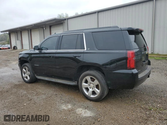 2015 Chevrolet Tahoe LT with VIN 1GNSKBKC6FR567296, listed as a Copart auction lot 50444825 with 160,911 mi miles and Salvage title. Bid and sale history available at DreamBid. Image 2.