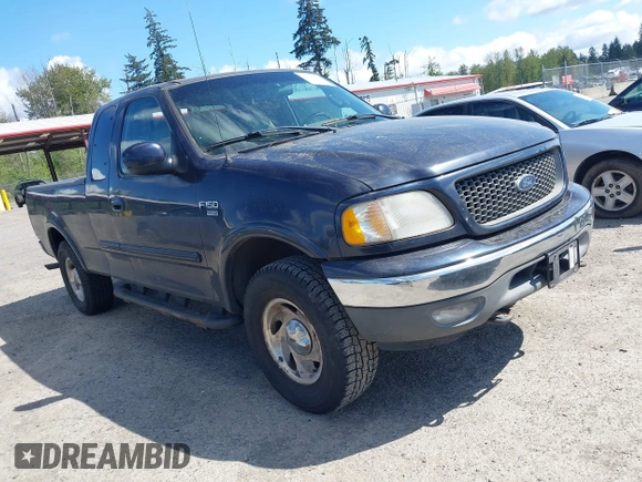 2001 Ford F-150 XL with VIN 1FTRX18L11NA30541, listed as a IAAI auction lot 42143117 with 187,855 mi miles. Bid and sale history available at carsss.com. Image 1.
