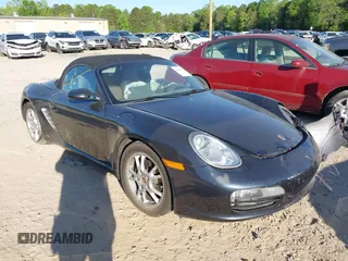 2005 Porsche Boxster z VIN WP0CA29835U712727, wystawiony jako IAAI lot #42032395 z przebiegiem 60 690 mil mil oraz . Historia ofert i sprzedaży dostępna na DreamBid. Obrazek 1.
