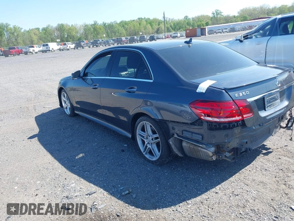 2014 Mercedes-Benz E 350 Sport with VIN WDDHF5KB8EA985121, listed as a IAAI auction lot 42124448 with 96,412 mi miles and . Bid and sale history available at DreamBid. Image 3.