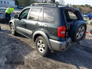 2005 Toyota RAV4 with VIN JTEGD20V250088126, listed as a IAAI auction lot 41601577 with 215,201 mi miles. Bid and sale history available at carsss.com. Image 3.