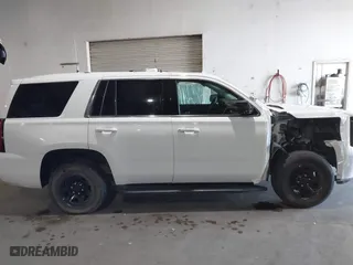 2020 Chevrolet Tahoe Commercial with VIN 1GNLCDEC8LR283902, listed as a IAAI auction lot 41670895 with 91,508 mi miles. Bid and sale history available at carsss.com. Image 14.