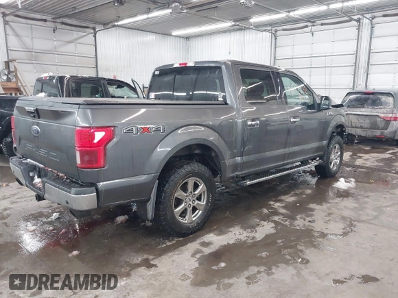 2018 Ford F-150 XL with VIN 1FTEW1E53JKF58493, listed as a IAAI auction lot 41517438 with 159,483 mi miles. Bid and sale history available at carsss.com. Image 4.