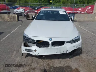 2019 BMW 4 Series 430i xDrive z VIN WBA4J3C55KBL08387, wystawiony jako IAAI lot #42248405 z przebiegiem 115 017 mil mil oraz . Historia ofert i sprzedaży dostępna na DreamBid. Obrazek 12.