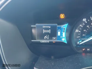 2018 Ford Fusion Hybrid SE with VIN 3FA6P0LUXJR131707, listed as a IAAI auction lot 41490634 with 129,500 mi miles. Bid and sale history available at carsss.com. Image 7.
