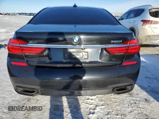 2016 BMW 7 Series 750i xDrive with VIN WBA7B0C50GG526899, listed as a Copart auction lot 46712485 with 97,985 mi miles and Salvage title. Bid and sale history available at DreamBid. Image 6.