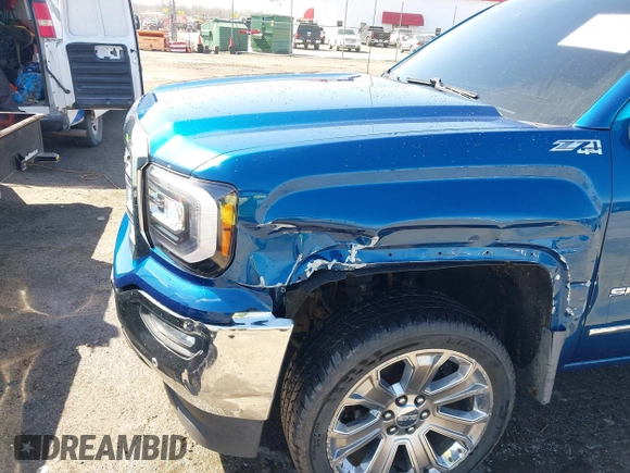 2018 GMC Sierra 1500 SLT z VIN 3GTU2NEC8JG254323, wystawiony jako IAAI lot #41772180 z przebiegiem 157 143 mil mil oraz . Historia ofert i sprzedaży dostępna na DreamBid. Obrazek 6.