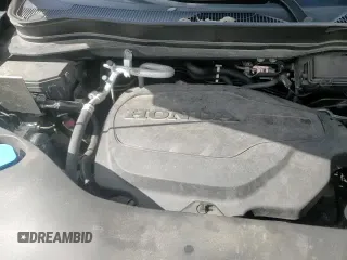 2021 Honda Passport EX-L z VIN 5FNYF8H55MB017318, wystawiony jako Copart lot #84193975 z przebiegiem 66 214 mil mil oraz Szkoda całkowita • Salvage title. Historia ofert i sprzedaży dostępna na DreamBid. Obrazek 14.