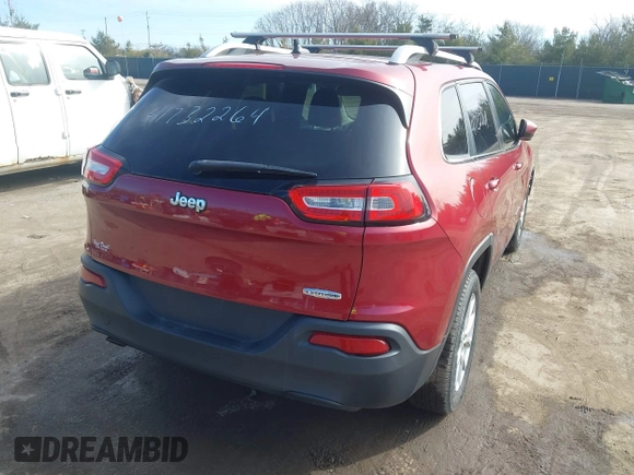 2014 Jeep Cherokee Latitude with VIN 1C4PJLCB1EW208600, listed as a IAAI auction lot 41732264 with 84,718 mi miles. Bid and sale history available at carsss.com. Image 4.
