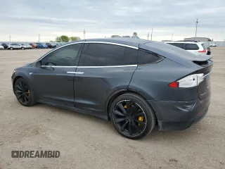2016 Tesla Model X 70D z VIN 5YJXCAE29GF006512, wystawiony jako Copart lot #57517885 z przebiegiem Nie podano mil oraz Szkoda całkowita • Salvage title. Historia ofert i sprzedaży dostępna na DreamBid. Obrazek 2.