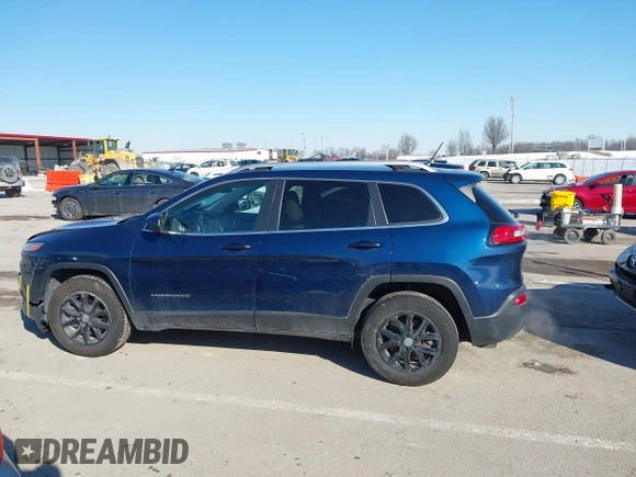 2018 Jeep Cherokee Latitude with VIN 1C4PJMCX6JD521729, listed as a IAAI auction lot 41641147 with 102,955 mi miles and . Bid and sale history available at DreamBid. Image 14.