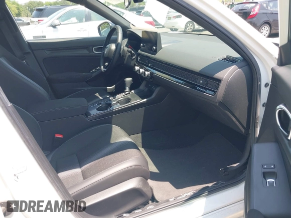 2024 Honda Civic Sport with VIN 2HGFE2F55RH563713, listed as a IAAI auction lot 42418239 with 9,687 mi miles and . Bid and sale history available at DreamBid. Image 5.