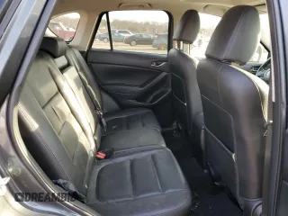 2014 Mazda CX-5 Grand Touring with VIN JM3KE4DY5E0372787, listed as a Copart auction lot 48873675 with 136,784 mi miles and Salvage Title. Bid and sale history available at carsss.com. Image 11.