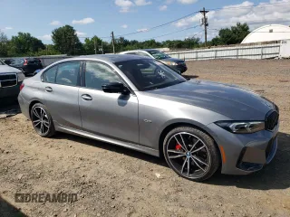2023 BMW 3 Series 330e xDrive with VIN 3MW39FS02P8D01319, listed as a Copart auction lot 67836734 with 12,883 mi miles and Salvage Title. Bid and sale history available at carsss.com. Image 4.