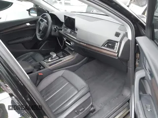 2023 Audi Q5 Premium Plus z VIN WA1BBAFY7P2187588, wystawiony jako IAAI lot #42052046 z przebiegiem 18 987 mil mil oraz . Historia ofert i sprzedaży dostępna na DreamBid. Obrazek 5.