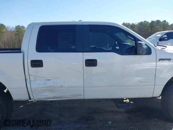 2013 Ford F-150 XL with VIN 1FTFW1ET7DKF33281, listed as a IAAI auction lot 41740736 with 205,677 mi miles. Bid and sale history available at carsss.com. Image 13.