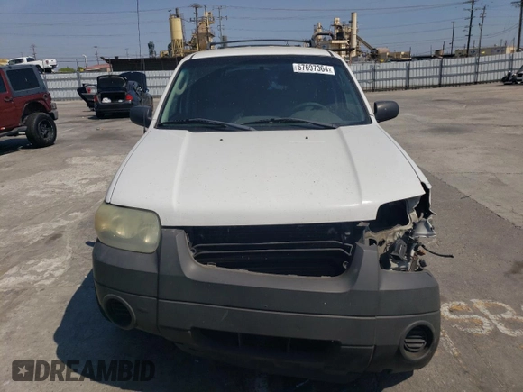 2006 Ford Escape XLS with VIN 1FMCU02Z36KA71926, listed as a Copart auction lot 57697364 with 225,212 mi miles and Salvage title. Bid and sale history available at DreamBid. Image 5.