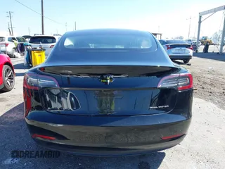 2018 Tesla Model 3 Long Range Battery with VIN 5YJ3E1EB9JF183920, listed as a IAAI auction lot 41657742 with 107,358 mi miles and . Bid and sale history available at DreamBid. Image 15.