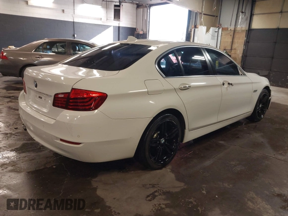 2014 BMW 5 Series 528i xDrive with VIN WBA5A7C57ED612230, listed as a IAAI auction lot 41586318 with 148,676 mi miles and . Bid and sale history available at DreamBid. Image 4.