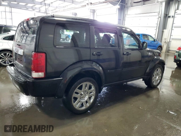 2008 Dodge Nitro SLT z VIN 1D8GU58KX8W206104, wystawiony jako Copart lot #71740974 z przebiegiem 236 981 mil mil oraz Szkoda całkowita • Salvage title. Historia ofert i sprzedaży dostępna na DreamBid. Obrazek 3.
