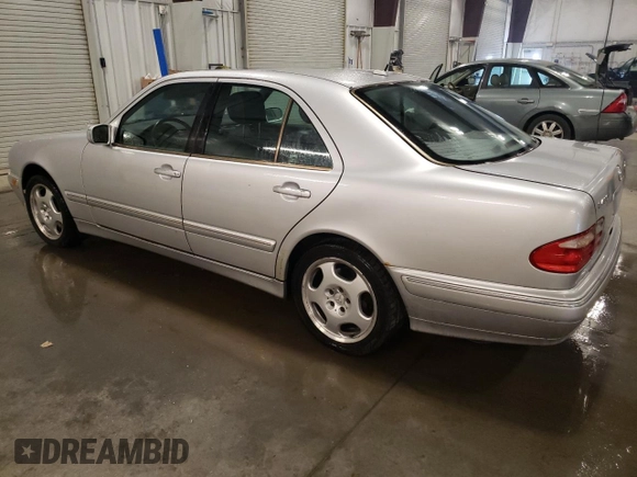 2001 Mercedes-Benz E 320/430 4 Matic with VIN WDBJF83J31X057905, listed as a Copart auction lot 50656425 with 155,217 mi miles and Salvage Title. Bid and sale history available at DreamBid. Image 2.