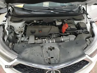 2021 Acura RDX z VIN 5J8TC2H34ML006095, wystawiony jako Copart lot #60210505 z przebiegiem Nie podano mil oraz Szkoda całkowita • Salvage title. Historia ofert i sprzedaży dostępna na DreamBid. Obrazek 12.