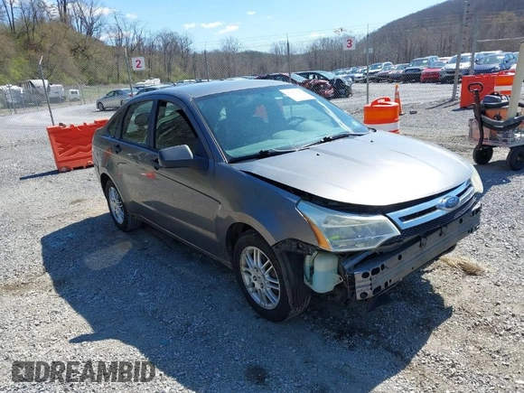 2010 Ford Focus SE with VIN 1FAHP3FN7AW233123, listed as a IAAI auction lot 41892154 with 285,214 mi miles. Bid and sale history available at carsss.com. Image 1.