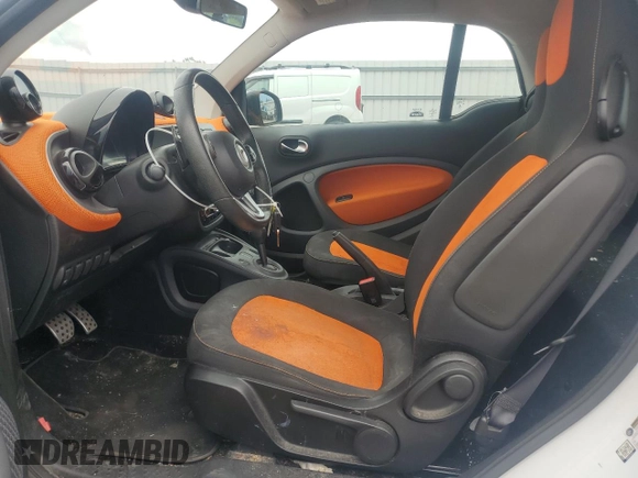 2016 Smart fortwo Passion with VIN WMEFJ5DA0GK060576, listed as a Copart auction lot 55641565 with 99,558 mi miles and Salvage title. Bid and sale history available at DreamBid. Image 7.